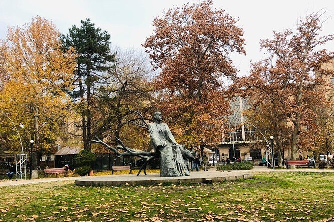 Evening walking tour in Yerevan - Vernissage Market at night: souvenirs and the Garegin Njdeh statue